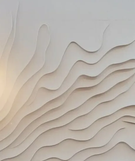 Layered relief in pale plaster, like wind-shaped dunes