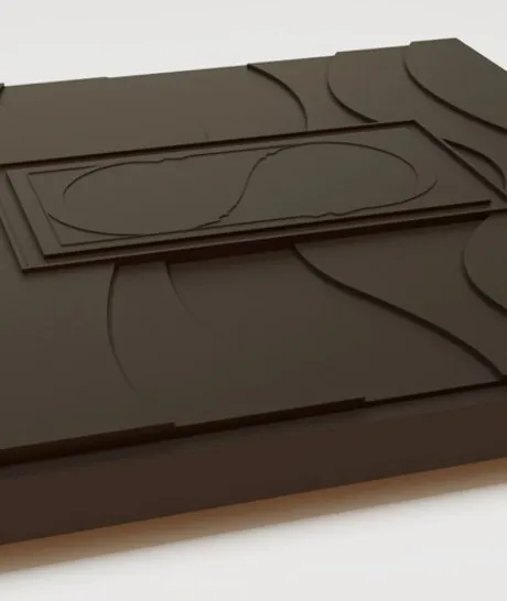 Close-up of a Sardal bar with its wave relief and central cartouche